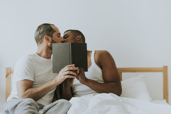 Gays with Book - Deposit Photos